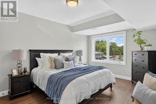 Primary bedroom 1 of 2 bedrooms - 2 - 19 Hampton Lane, Selwyn, ON 