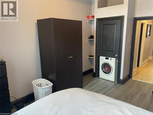 Bedroom with laundry - 195 King Street E Unit# 1, Hamilton, ON - Indoor Photo Showing Bedroom