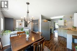 Dining room with view towards kitchen and upper landing - 