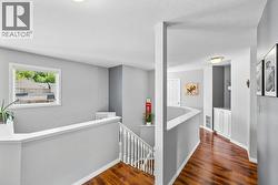 Top of staircase and hallway to patio - 