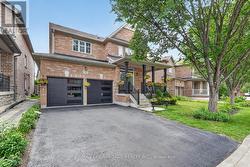 Newly Replaced Garage Door Offering Style. - 