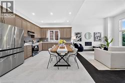 Open-concept living space with a modern kitchen and living area - 