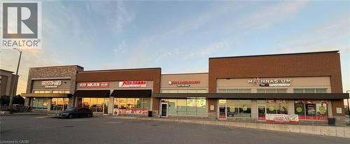 Commercial plaza featuring brick and stone facades - 9 Beaumaris Drive Unit# B4, Brampton, ON 