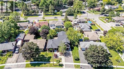 Residential street with varied architectural styles and mature trees - 23 Mackenzie Drive, Georgetown, ON 