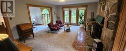 Living Room off Kitchen with Walkout to Back Deck - 