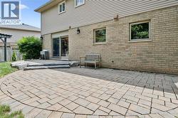 Multi-level paver patio with stone steps - 