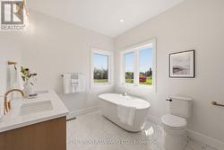 spacious 5 piece bath - ensuite to primary bedroom - 