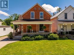 Covered wrap around front porch - 