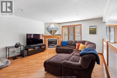 5760 Wayne, Lasalle, ON - Indoor Photo Showing Living Room With Fireplace