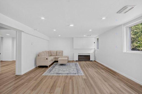 Family Room - 70Z Rue Roussin, Montréal (L'Île-Bizard/Sainte-Geneviève), QC - Indoor With Fireplace