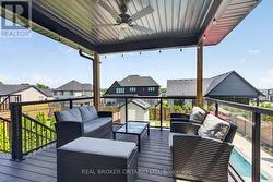 Composite deck with aluminum and glass railings - 
