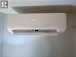 Wall-mounted mini-split system with digital temperature display - 