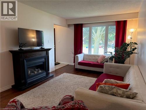 34 Nora Court, Cambridge, ON - Indoor Photo Showing Living Room With Fireplace