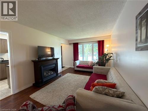 34 Nora Court, Cambridge, ON - Indoor Photo Showing Living Room With Fireplace