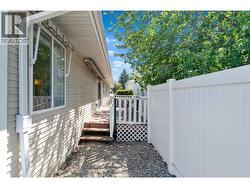 Patio with stairs down to dog run - 