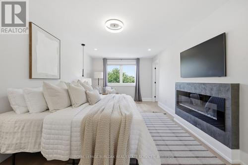 2029 Kempton Park Drive, Mississauga, ON - Indoor Photo Showing Bedroom With Fireplace