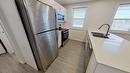 4816 52 Street, Wetaskiwin, AB  - Indoor Photo Showing Kitchen With Double Sink 