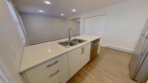 4816 52 Street, Wetaskiwin, AB - Indoor Photo Showing Kitchen With Double Sink