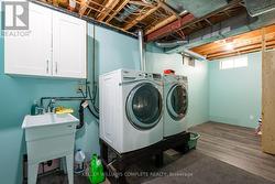 Large laundry room with tons of storage - 