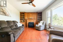 Great room w/gas fireplace overlooking Black Creek - 
