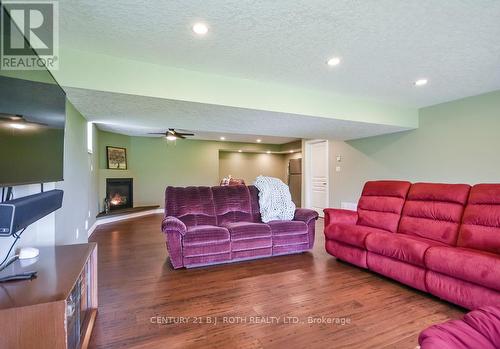 Spacious rec room with gas fireplace - 5051 Sideroad 25, Ramara, ON 