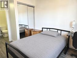 Primary Bedroom with Staged Bed using AI. - 