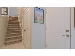 Foyer leading to stairs going to main floor-garage access to the right - 