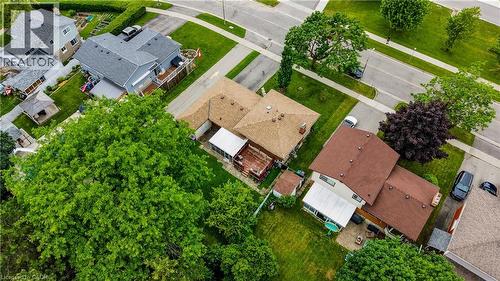Aerial perspective showcasing a residential neighborhood with paved streets and sidewalks - 619 Forest Hill Drive, Kitchener, ON 