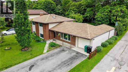 Two-story brick and siding residence with an attached garage - 619 Forest Hill Drive, Kitchener, ON 