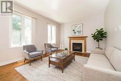 Family room off the kitchen *virtually styled - 