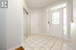 Foyer with coat closet + inside entry - 