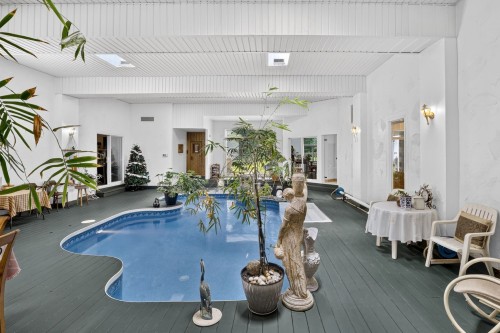 Piscine - 87 Rg St-François, Lanoraie, QC - Indoor Photo Showing Other Room With In Ground Pool