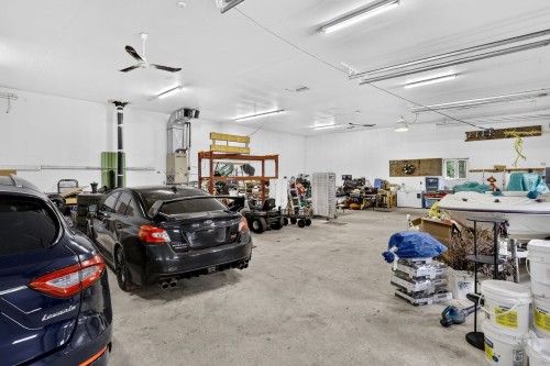 Garage - 87 Rg St-François, Lanoraie, QC - Indoor Photo Showing Garage