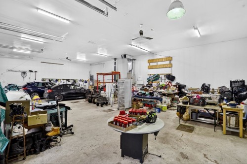 Garage - 87 Rg St-François, Lanoraie, QC - Indoor Photo Showing Garage