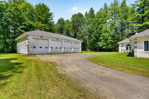 Garage - 87 Rg St-François, Lanoraie, QC - Outdoor With Exterior