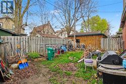 Private yard space featuring a wood fence. - 