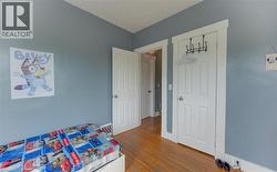 Hardwood flooring extending throughout the room - 