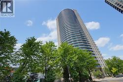Contemporary high-rise architecture featuring a curvilinear facade and private balconies - 