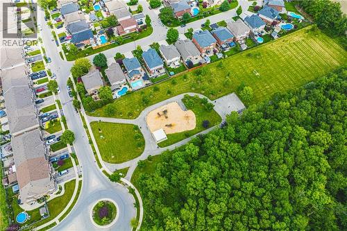 Aerial perspective showcasing a residential neighborhood with varied housing styles - 20 Degrow Crescent, Binbrook, ON 
