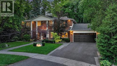 Brick exterior with a prominent portico featuring stately columns - 1638 Ruscombe Close, Mississauga, ON 