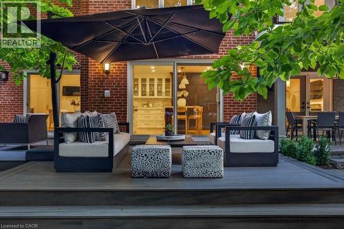 Multi-level wood-finish deck with brick exterior - 1638 Ruscombe Close, Mississauga, ON 