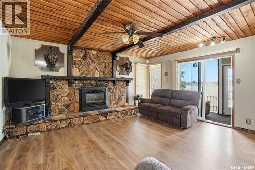 205 Bay Drive W, Christopher Lake, SK - Indoor Photo Showing Living Room With Fireplace