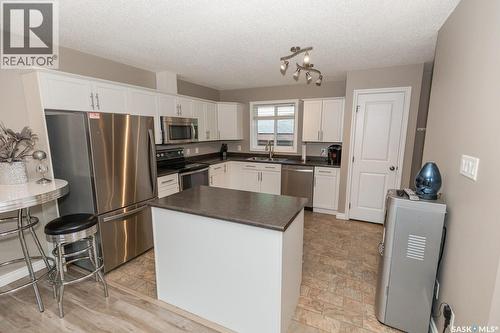 111 4Th Avenue, Coleville, SK - Indoor Photo Showing Kitchen With Double Sink