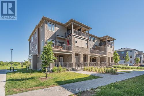 369 Olivenite Private, Ottawa, ON - Outdoor With Balcony With Facade
