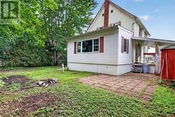 Backyard with storage shed - 