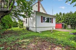 Backyard with storage shed - 