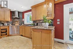 Kitchen shows extended countertop/cabinets - 