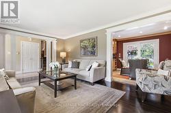 another view of living rm & dining rm out to patio - 