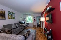 Living room, looking towards front door. - 