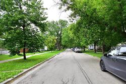 Picture yourself on this picturesque tree-lined street! - 
